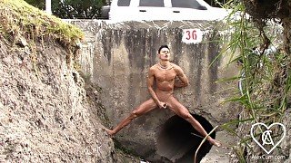 Daring Young Man Undresses In a CULVERT Under The Road And Masturbates Tasty With His Legs Spread.