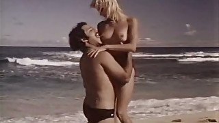 Ron Jeremy gets laid with beautiful shapely blondie on the beach