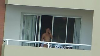 voyeur girl nude in balcony argentina . far away ( 200 m)