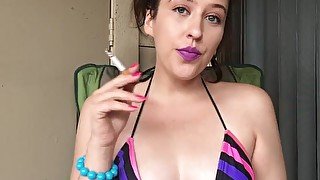 Goddess D Smoking in Rainbow Bikini Top and Purple Lipstick - Perky Tits