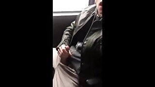 Twinks cums in public on the back of a bus