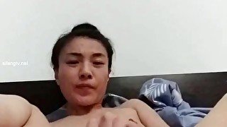 Chinese MILF Masturbating