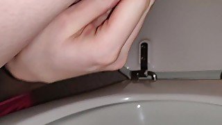 Sideways pee on the toilet