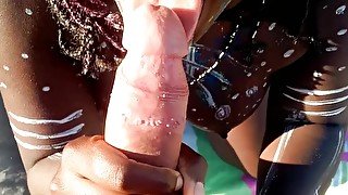 JUICY EBONY IN TRIBAL PAINT INTERRACIAL BLOWJOB IN THE WOODS PUBLIC CUM POV