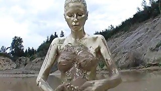Golden paint muddy girl
