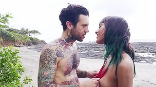 Tattooed man has a blast fucking Janice Griffith on a beach