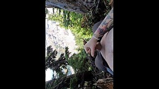 Fat boy cums on a mountain