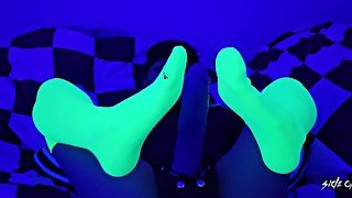 Domme with Strap-on puts on Neon Socks Under Black Light - Socks and Feet - Video 9