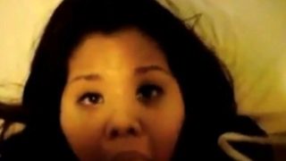 Asian slut sucks and receives cum on her face