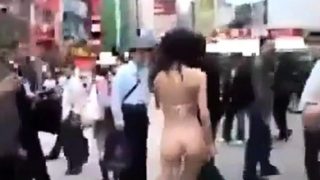 Walking semi-nude in Tokyo Streets