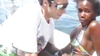 After a ride of boat he wants to fuck his friend's black ass on a desert beach