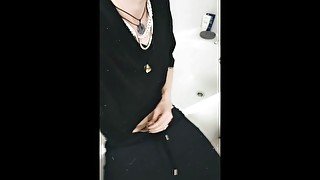 Young twink pissing on his self in bathroom while friends are downstairs