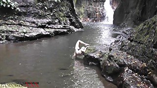 Flexible Beauty At The Waterfall - Watch4Fetish