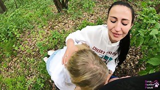 Two girlfriends suck cock in the woods - POV