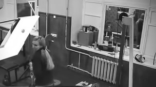 Sexy blond babe drops out her tits and gets in the security camera