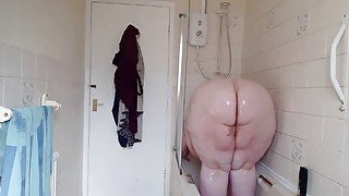 SSBBW covered in baby oil in shower