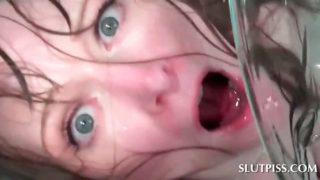 Tied up sex slave gets a bowl of piss poured on her face