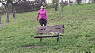 Peeing babes empty their bladders in a park