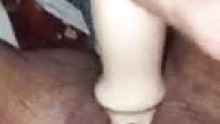 BBW fucks her pussy with a dildo