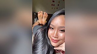 Cute Lying On Her Tummy Teasing With Her Sexy Asian Feet