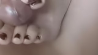 Asian Teen Footjob