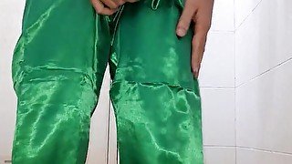 Crossdresser masturbate and cum wearing shiny satin pajamas