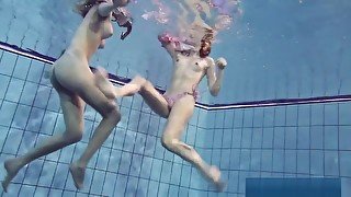 Horny Girls Strip Eachother In The Pool