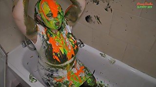 BBW in white dress covers herself in paint from head to toe sploshing