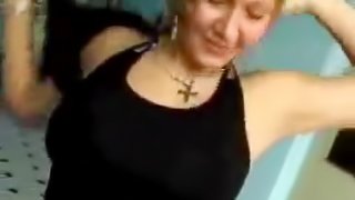 Big breasted blonde girlfriend gives a nice blowjob