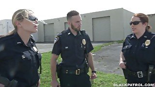 Two police women fuck arrested black dude and make him lick twats