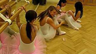 Cute voracious ballerinas in tutus boast of natural tits in front of each other