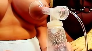 Mistress pumps slave tits for milk