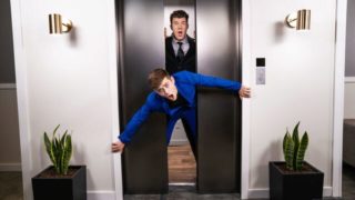 Businessmen JJ Knight and Joey Mills fuck in an elevator