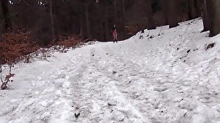 Hot and Sexy Brunette Releases Powerful Pee Outside In Snow