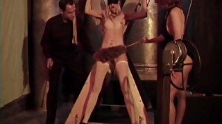 Sexy Blonde Is Bound In Red And Has Clamps Applied By Sadist