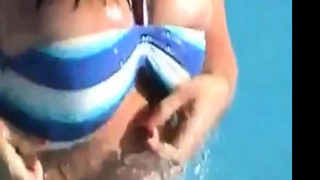 Tiny tits and ass exposed on the waterslide