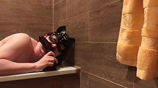 Masked sissy worships BBC in a bathroom