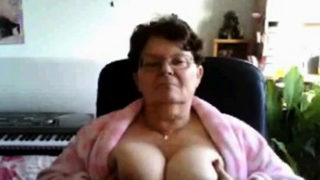 naughty granny flashing her big tits on cam