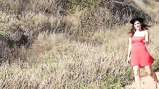 Cutie in a red dress walks a hiking trail and is fondled by an odd stranger.