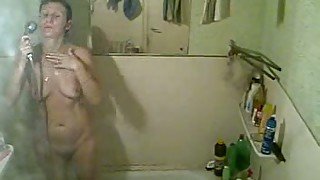 Spy cam video of my neighbor's mature wife taking shower