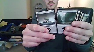 Nerd Opening a Pack of Trading Cards