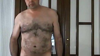 Gorgeus spanish huriste bear wanking his uncut cock