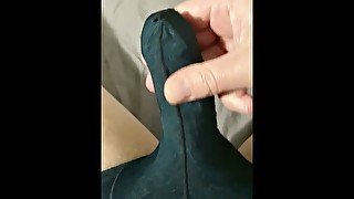 Jerking thru elephant pants with cumshot