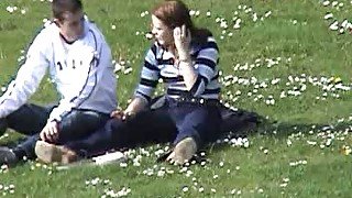 Amateur redhead girl jacks off her bf's dick in park - spy cam