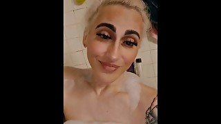 Tgirl in bubble bath teasing