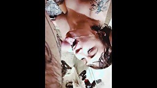 HOT TATTOOED BRUNETTE TAKES HUGE LOAD TO THE FACE IN SHOWER