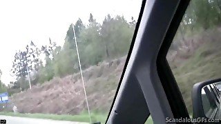 Hot Babe rubbing a cock while the guy driving caught on tape