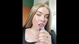 Transgender woman sucks dildo! Link below ⬇️