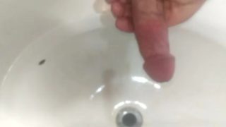 Jacking off into the sink