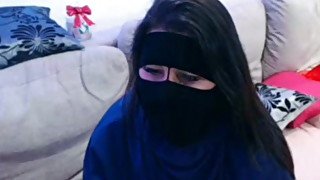 Chubby MILF in hijab masturbates on webcam